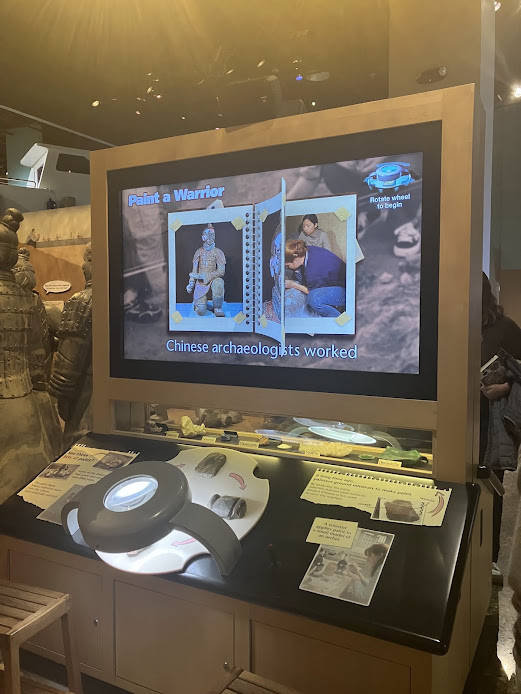 Legacy Paint-a-Warrior kiosk setup in Treasures of the Earth exhibit